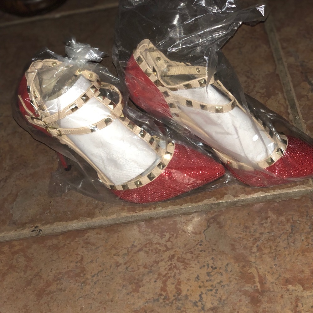 Red and back studded causal heels